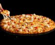 הפיצה הקריספית החדשה של דומינו'ס מהדרין: Crispy Pizza