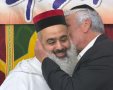אבי אמסלם והרב גוזל. המצלם