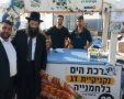הרב בוגנים לצד דוכן ברכת הים ביריד. א' מיכאלי