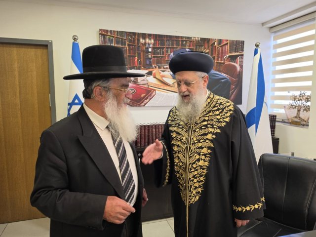 מ